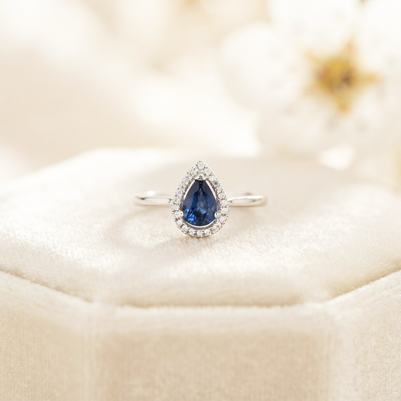 Blue Sapphire Pear Shape 0.64 Carat with Diamond Halo Ring in 14K White Gold