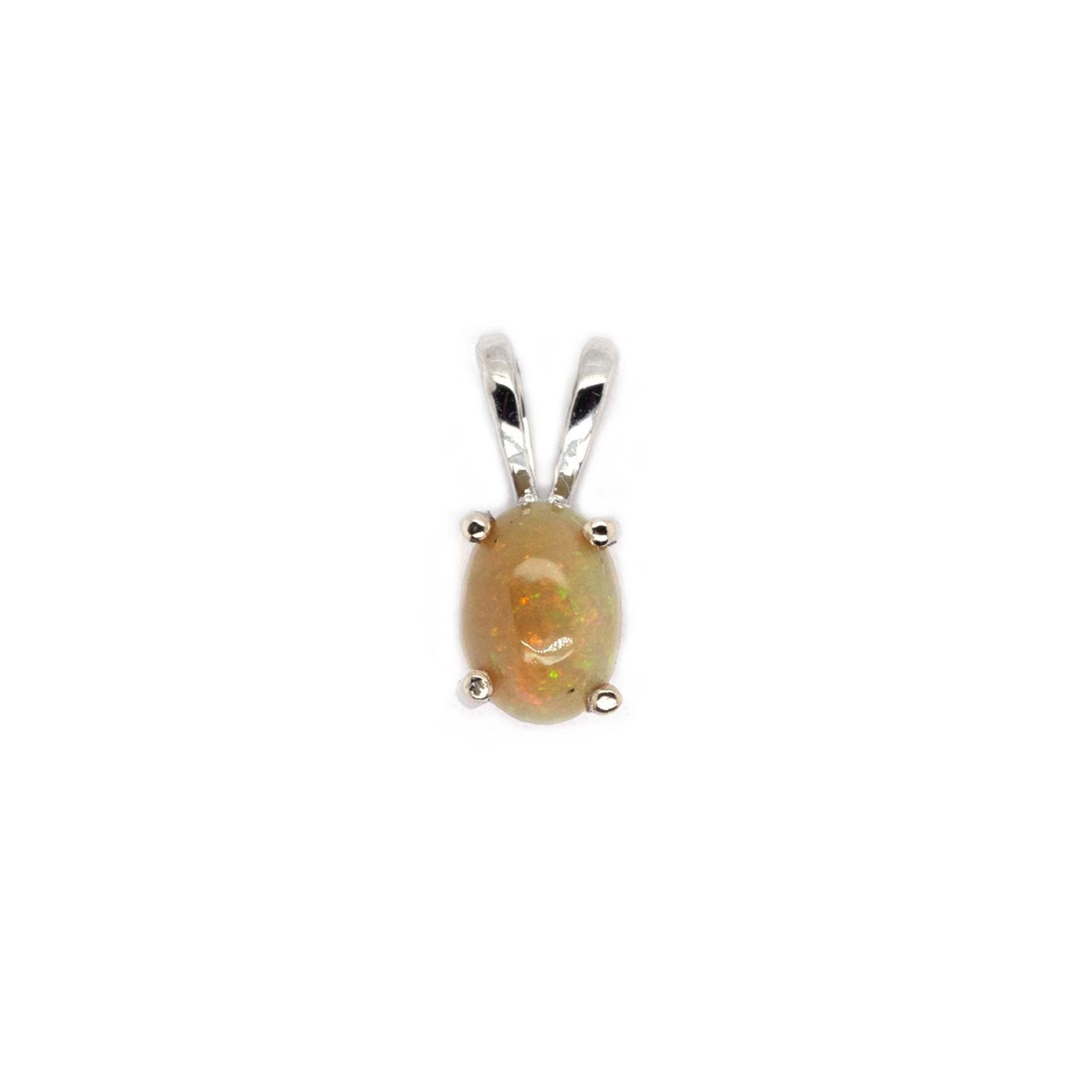 Ethiopian Opal Cab Oval 7x5mm, 0.55 Carat Solitaire Pendant in 14K White Gold (Chain Not Included)